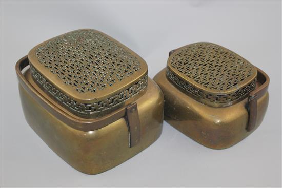 Two Chinese bronze hand warmers, 18th / 19th century, 17cm and 20.5cm, repair to smaller cover